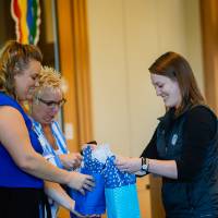 Panelist are given gift bags at the Laker Legacy Brunch